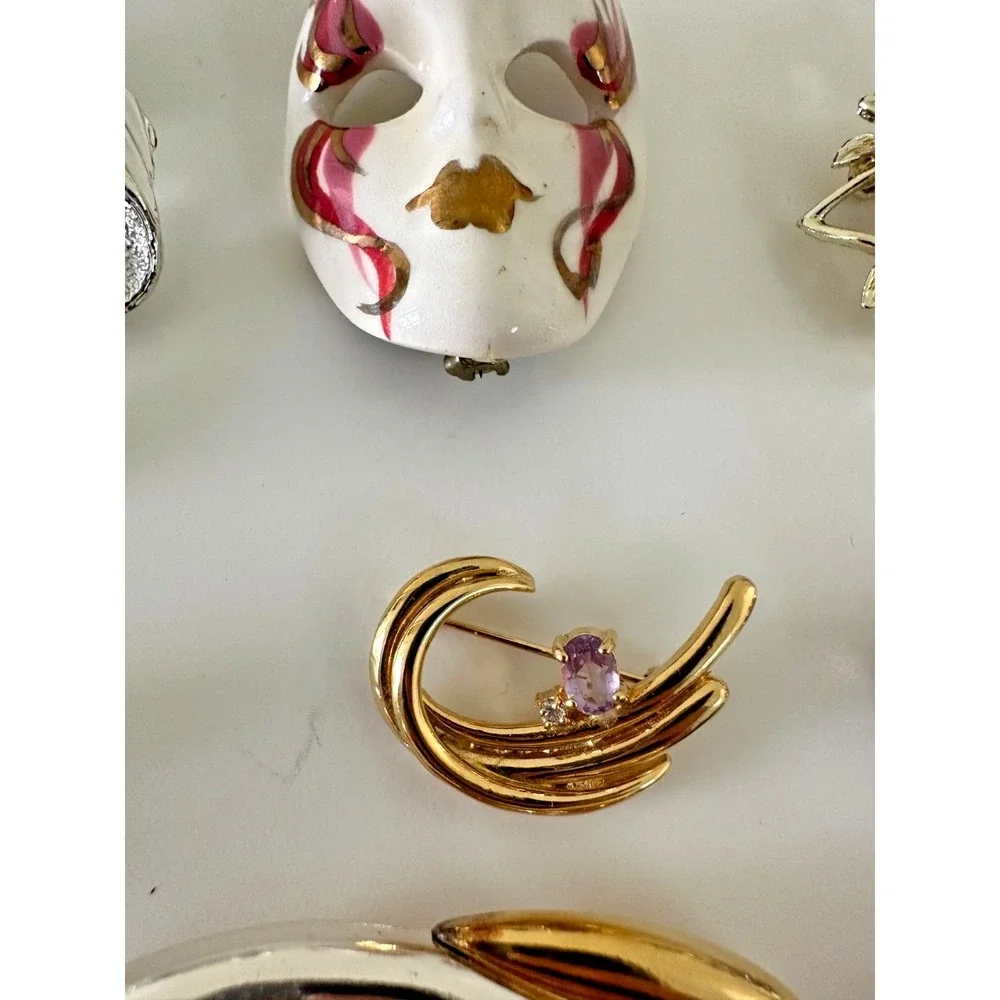 The Unbranded Brand brooch painted